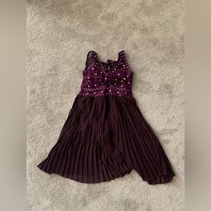 Purple dress with build in leotard dance costume